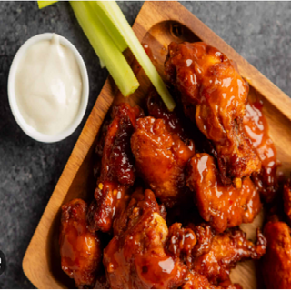 ALAS DE POLLO MARINADAS EN SALSA