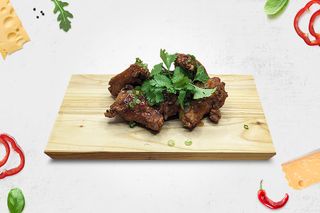 Курячі крильця в кисло-солодкому соусі