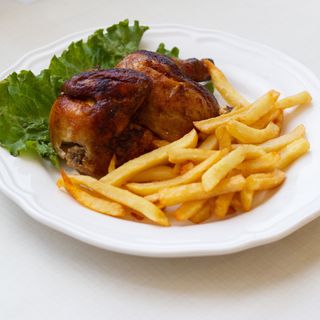 1/2 Pollo Asado con Guarnición