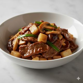 Ternera con bambú y setas