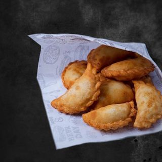 Вареники жареные