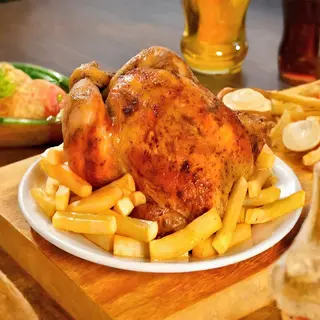 1 Pollo Entero Para Llevar + Coca-Cola Sabor Original botella 2L.