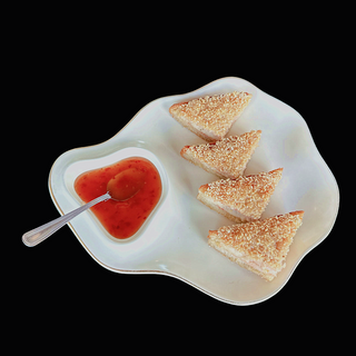 Pan Tostado con Langostino y Sésamo (4 unidades)