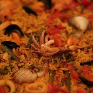 Paella De  pescado y Marisco (Ración)