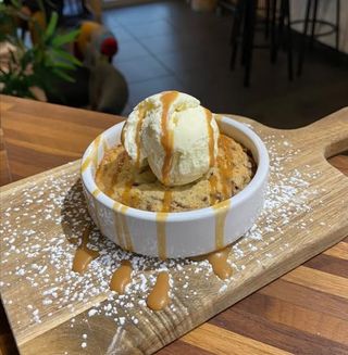 Warm cookie with caramel sauce 