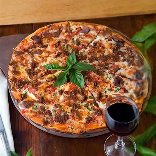 2 Pizza nyama Get 1 Free! ( Monday & Tuesday ONLY)