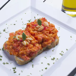 Magro Con Tomate 