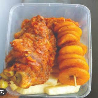Crispy fried yam , plantain and peppered turkey