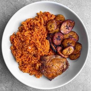 Jollof Rice With plantain And  Chicken/Turkey