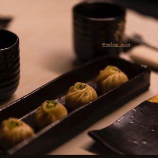 Ravioli alla piastra di maiale