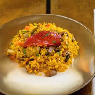 Ración de arroz con higaditos de pollo