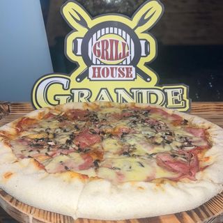 Pizza Prosciutto e funghi (mare)