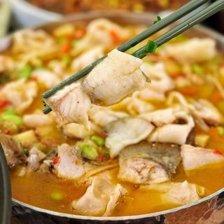 76.Pesce con salsa di fagioli neri