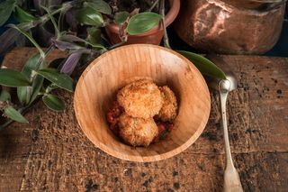 Mushroom Balls with Roqufort Cheese and Meat on Salsa Sauce