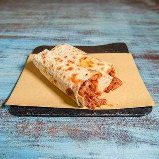 7. Prosciutto cotto, caciotta piccante, rucola, pomodoro, funghi