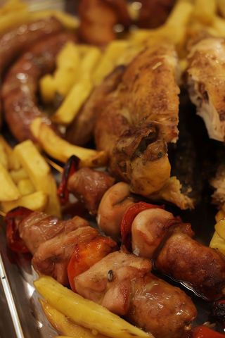 Metà pollo cotto a legna