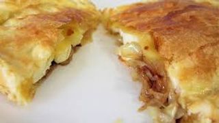 Empanada de cebolla caramelizada (1 ud.)