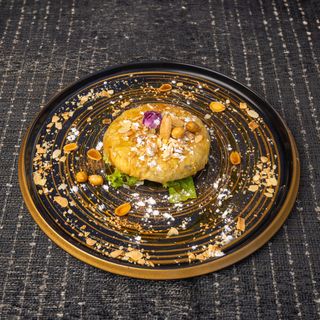 Pastilla au poulet et aux amandes