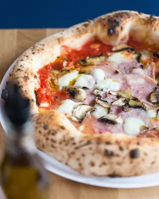 Prosciutto e funghi