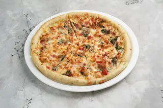 Пицца с курицей и шпинатом (650 гр.)