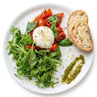 Burrata Con Rucola Y Tomate Cherry