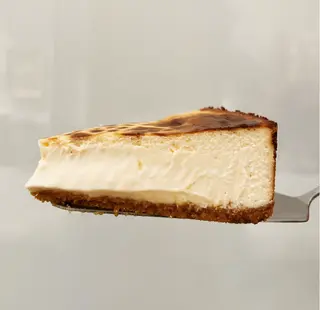 Tarta de queso clásica · Porción