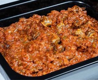 Ración caracoles con tomate