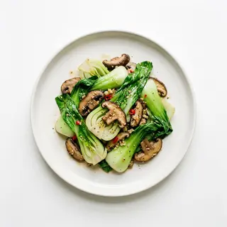 Pak choi saltato con funghi