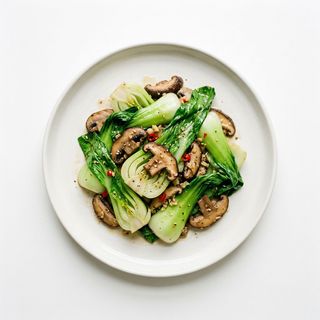 Pak choi saltato con funghi