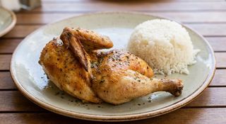 Cuarto De Pollo Con Arroz