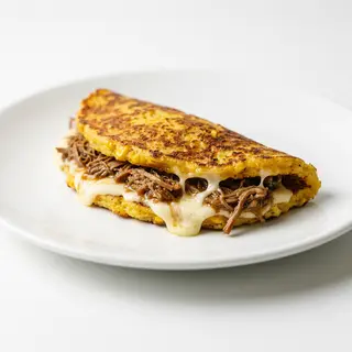 Cachapa De Carne Mechada Y Queso