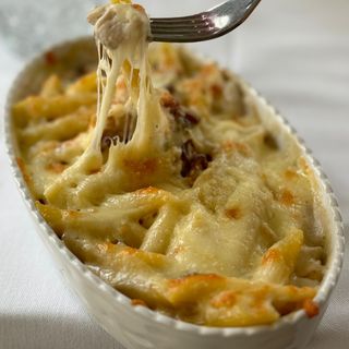 Penne con pollo al forno