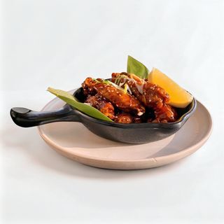 Alitas con salsa teriyaki (7 pcs)