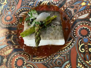 Bacalao al gratén de pimientos del piquillo.
