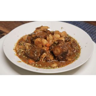 Jamaican oxtail  and broad beans