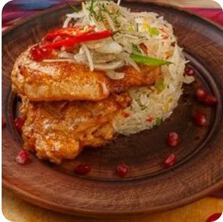 Курица на огне с рисом