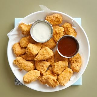 Панирани пилешки хапки (250гр)