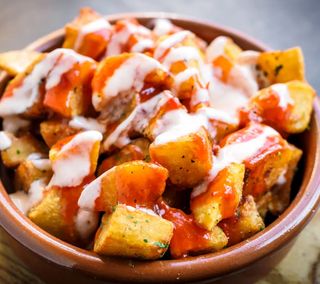 Ración De Patatas Bravas