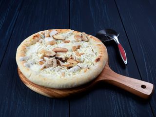 Pizza crema di tartufo e porcini L