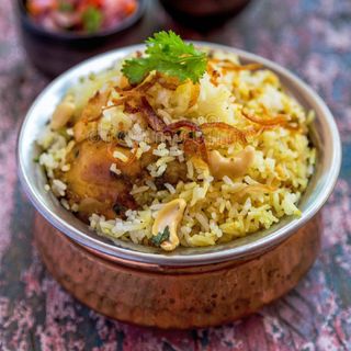 Chicken Dum Biryani - Medium Pack (650 ML) + 1 Drink