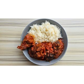 Rice and Stew (Goat, Beef, Chicken, Turkey, or Fish)