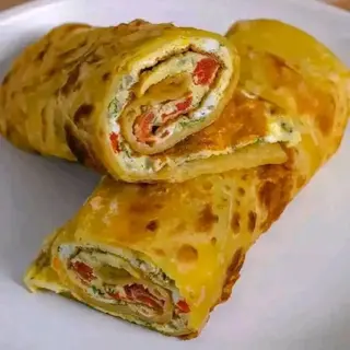 Chicken Rolex (Served with kachumbari)