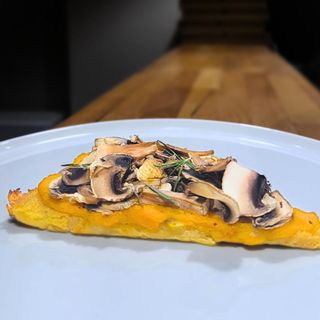 Faina con calabaza y champiñones