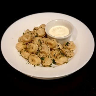 Пельмені з м'ясом та сметаною