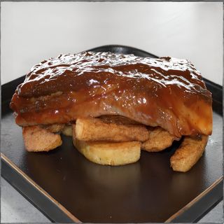 Coaste de porc cu cartofi fripți în untură