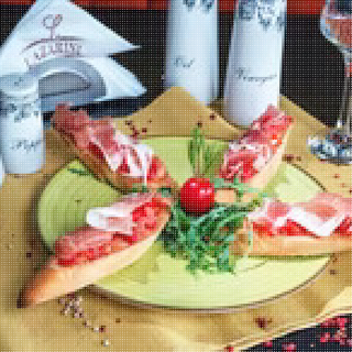 Bruschete cu prosciuto crudo 