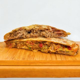 Iltaco De Carne De Cerdo Con Salsa Chipotle