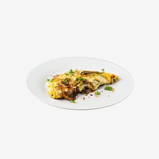Omletă Prosciutto e funghi