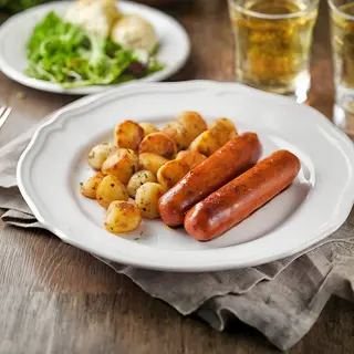 Wurstel alla griglia con patate al forno