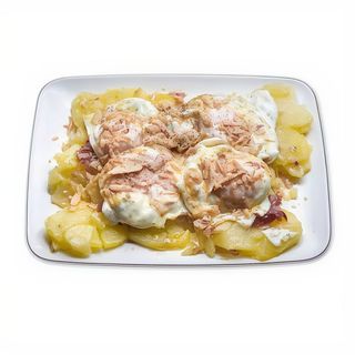 Huevos rotos con jamón de Guijuelo